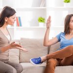 teens communication mother daughter couch fighting