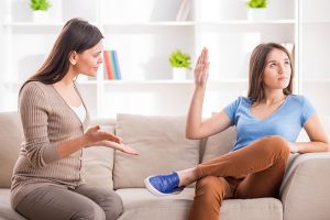teens communication mother daughter couch fighting