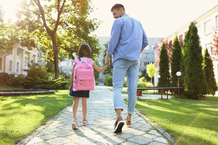 father and daughter go to school