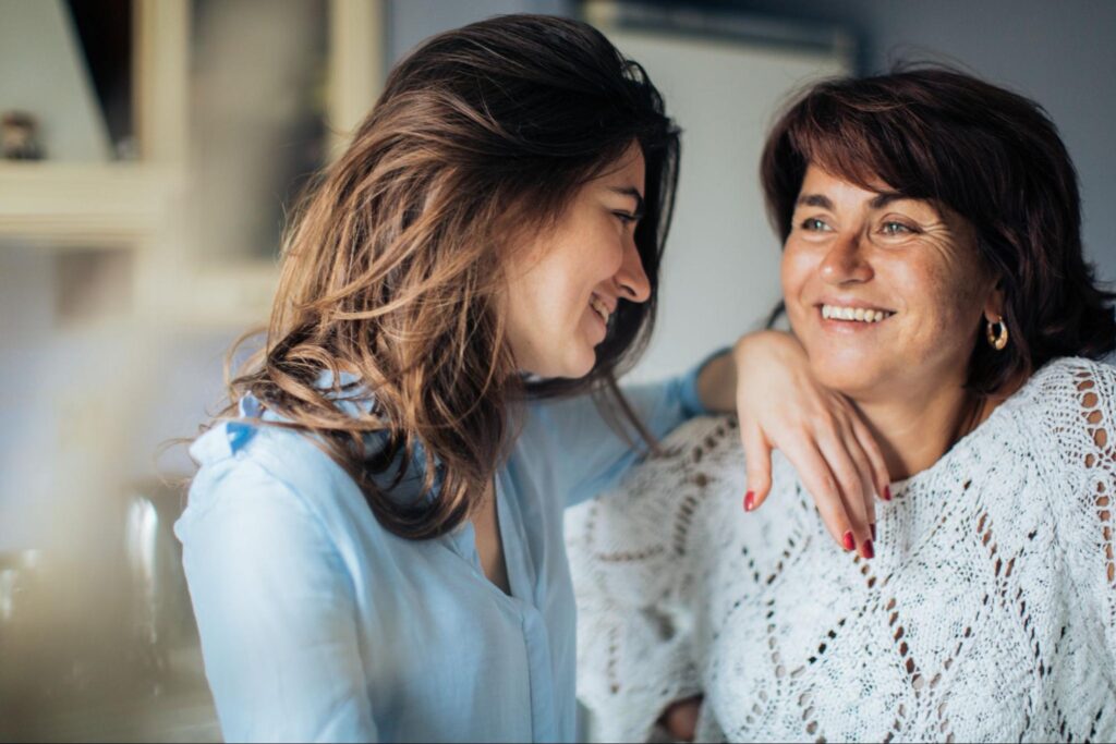 Mother talking to daughter, Parenting Girls: Guiding Your Daughter Through the Storm and Being Her Calm Center, calm parenting, Parenting Classes for Your Employees