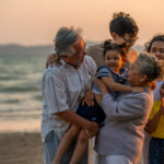 intergenerational family on the beach