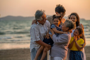 intergenerational family on the beach